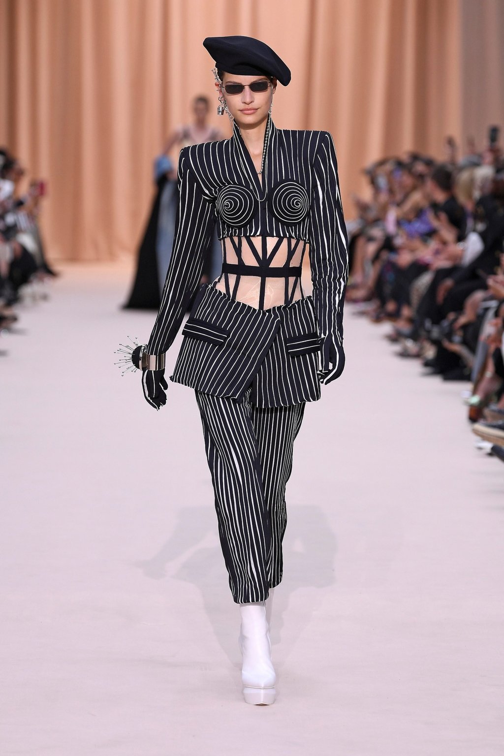 More waistcoat than jacket? Another look from the collection, with an obvious nod to Gaultier’s fascination for corsetry. Photo: Xinhua