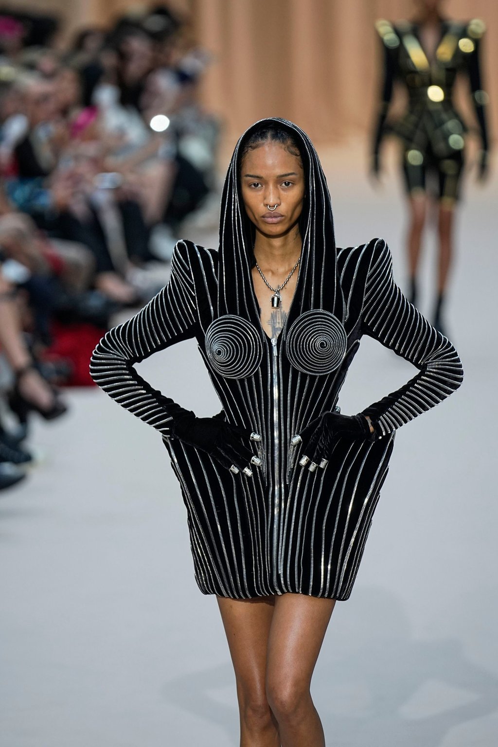 This look channelled Jean Paul Gaultier’s famous exaggerated tuxedos of past collections. Photo: AP