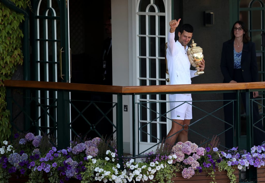 Novak Djokovic celebrates with the trophy after winning the men’s singles at Wimbledon. Photo: Xinhua Novak Djokovic celebrates with the trophy after winning the men’s singles at Wimbledon. Photo: Xinhua