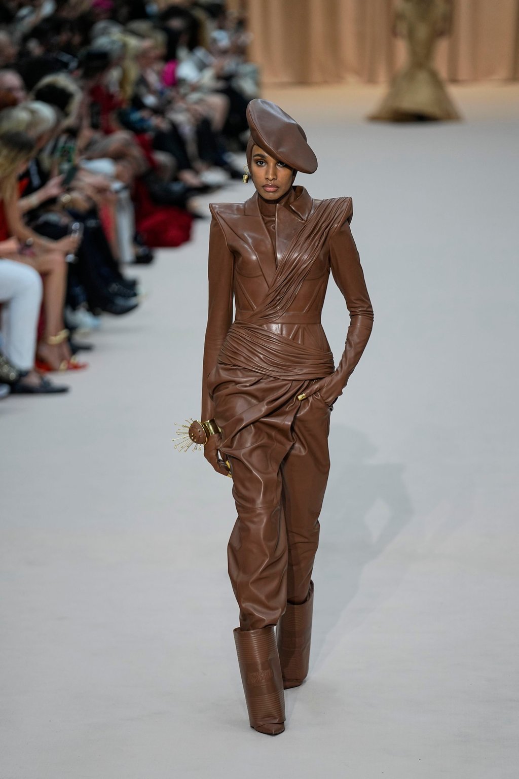 An all-brown look from Jean Paul Gaultier’s haute couture autumn/winter 2022-2023 fashion collection presented on July 6 in Paris. Photo: AP