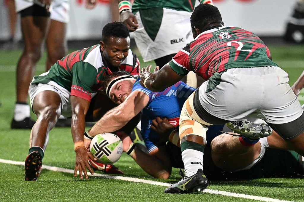 Namibia’s flanker Wian Conradie scores his team’s second try against Kenya. Photo: AFP