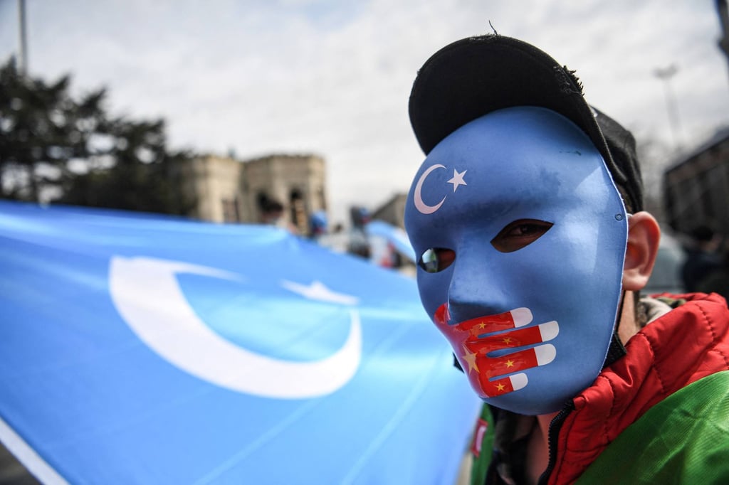 A demonstrator during a protest in Istanbul by supporters of the Uygurs. At least one million Uygurs and people from other mostly Muslim groups have been held in camps in Xinjiang, according to rights groups that accuse Chinese authorities of imposing forced labour. Photo: AFP A demonstrator during a protest in Istanbul by supporters of the Uygurs. At least one million Uygurs and people from other mostly Muslim groups have been held in camps in Xinjiang, according to rights groups that accuse Chinese authorities of imposing forced labour. Photo: AFP