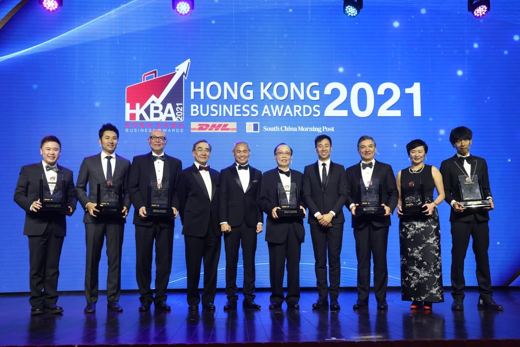 Winners of the 2021 DHL-SCMP Hong Kong Business Awards, during a gala dinner in Hong Kong on 2 December 2021: (L to R), Stanley Kwok, Co-Founder of KnitWarm Limited; Ronald Chan Yik-long, Executive Director of Modern Dental Group Limited; Donald Choi, Executive Director of ChinaChem Group; Professor Richard Wong, Provost and Chair of Economics, the University of Hong Kong; Ng Chee-choong, Senior Vice-President of DHL Express Hong Kong and Macau; Kenneth Lo, Chairman of Crystal International Group Limited; Gary Liu, CEO of South China Morning Post; Sebastian Paredes, Chief Executive Officer of DBS Hong Kong; Sammi Hung, Regional Head of Shanghai Fosun Pharmaceutical (Group) Company Limited; Benny Liu, Founder of HK Decoman Technology Limited. Photo: May Tse Winners of the 2021 DHL-SCMP Hong Kong Business Awards, during a gala dinner in Hong Kong on 2 December 2021: (L to R), Stanley Kwok, Co-Founder of KnitWarm Limited; Ronald Chan Yik-long, Executive Director of Modern Dental Group Limited; Donald Choi, Executive Director of ChinaChem Group; Professor Richard Wong, Provost and Chair of Economics, the University of Hong Kong; Ng Chee-choong, Senior Vice-President of DHL Express Hong Kong and Macau; Kenneth Lo, Chairman of Crystal International Group Limited; Gary Liu, CEO of South China Morning Post; Sebastian Paredes, Chief Executive Officer of DBS Hong Kong; Sammi Hung, Regional Head of Shanghai Fosun Pharmaceutical (Group) Company Limited; Benny Liu, Founder of HK Decoman Technology Limited. Photo: May Tse