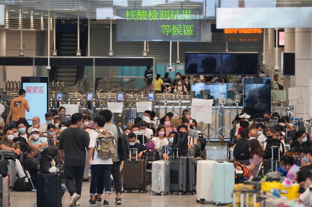 Travellers queue up at the departure hall of Shenzhen Bay Port. Photo: Sam Tsang