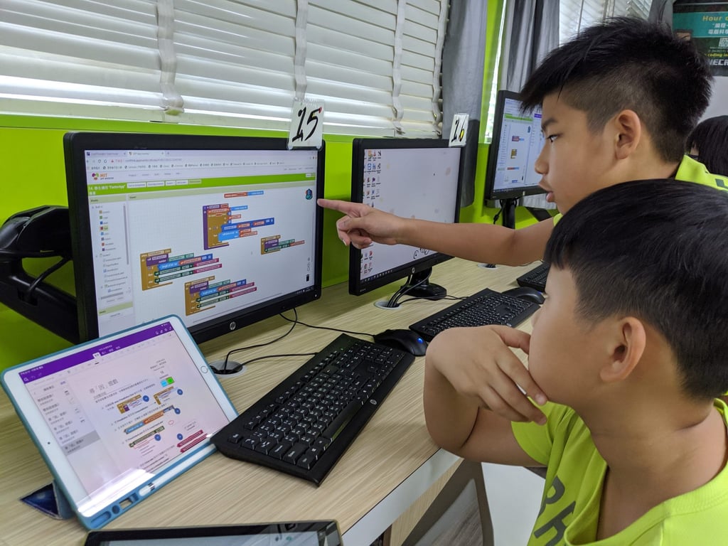Students work on their coding skills as part of the CoolThink@JC curriculum. Photo taken before the pandemic. Photo: HKJC