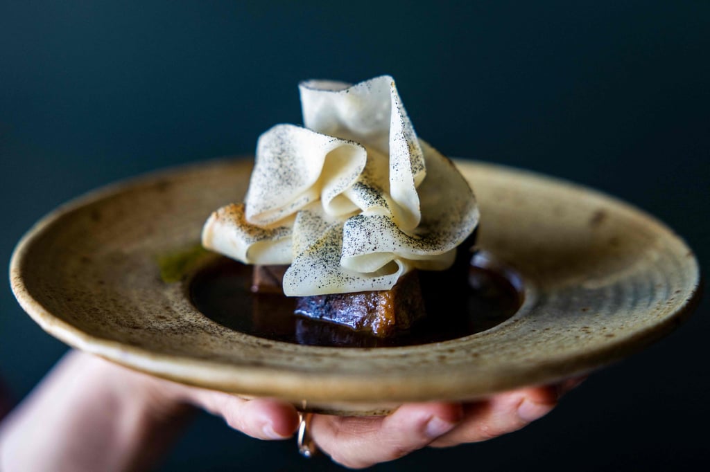 Musk ox broth, a creation by chef Poul Andrias Ziska at Koks in Ilimanaq, Greenland. Photo: AFP