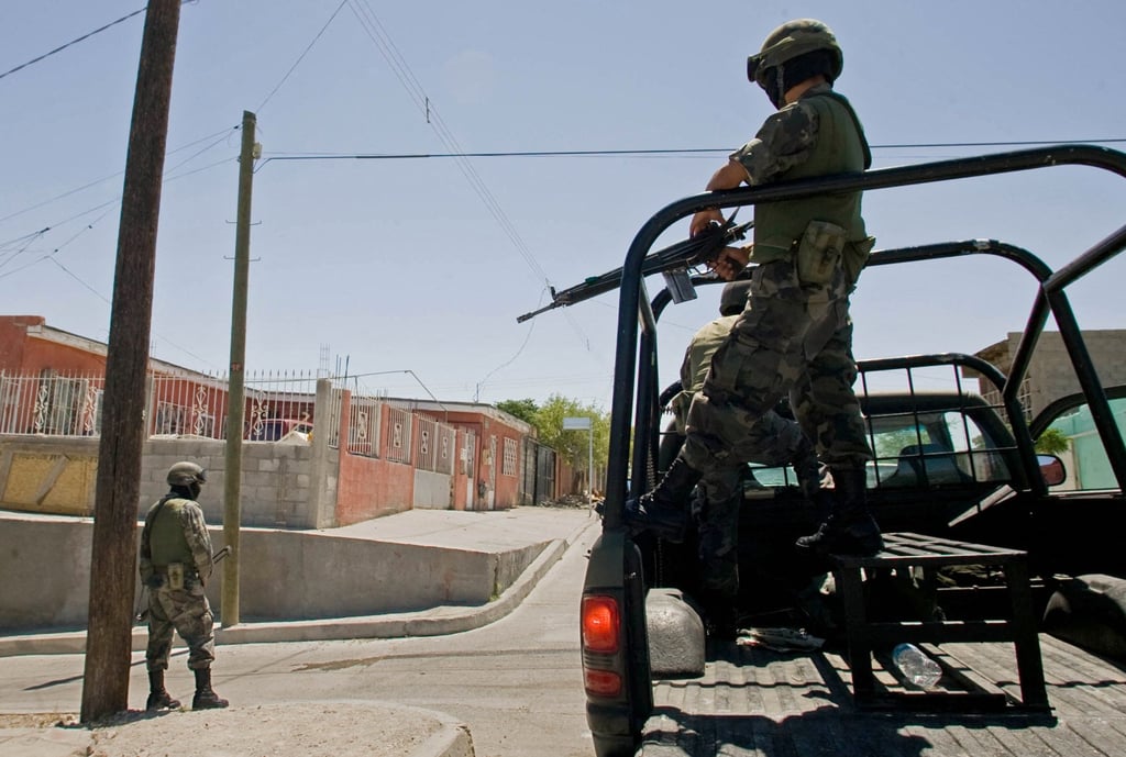 Mexican Army soldiers patrol Ciudad Juarez in northern Mexico in 2008 following a wave of violence sowed by drug cartels vying for control of the city. Photo: AFP