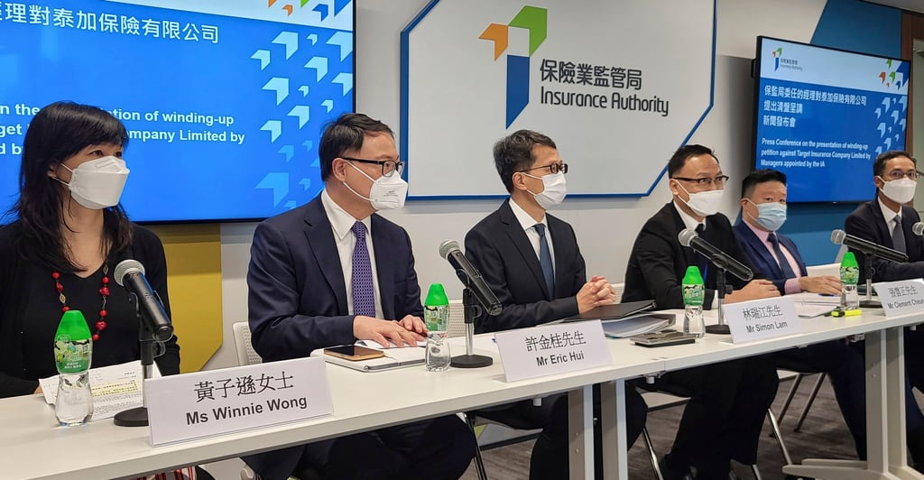 (Left to right): Hong Kong Federation of Insurers’ chairwoman Winnie Wong, the Motor Insurance Bureau’s chairman Eric Hui, the Insurance Authority’s executive director of general insurance Simon Lam, the Insurance Authority’s chief executive Clement Cheung Wan-ching, Deloitte China’s vice-chairman and Target’s manager Derek Lai Kar-yan, and Lai’s legal adviser Harris Chan, at a media briefing on July 15, 2022 at Insurance Authority’s office in Wong Chuk Hang. Photo: Enoch Yiu.