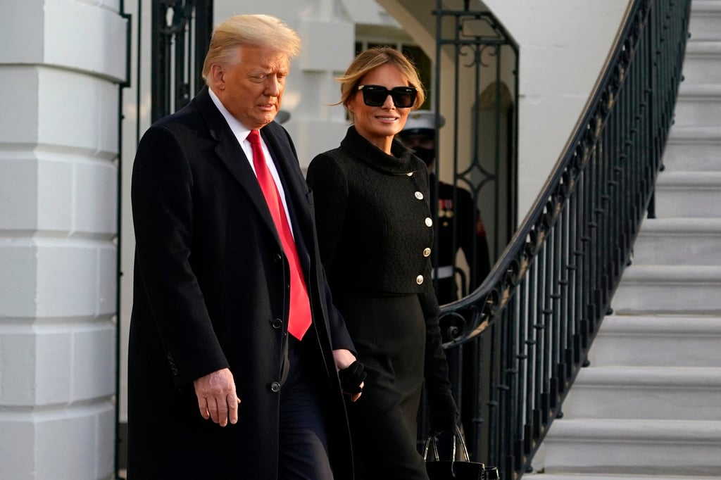 Former US president Donald Trump and former first lady Melania Trump walk to board Marine One on the South Lawn of the White House, in January 2021, in Washington DC. Photo: AP