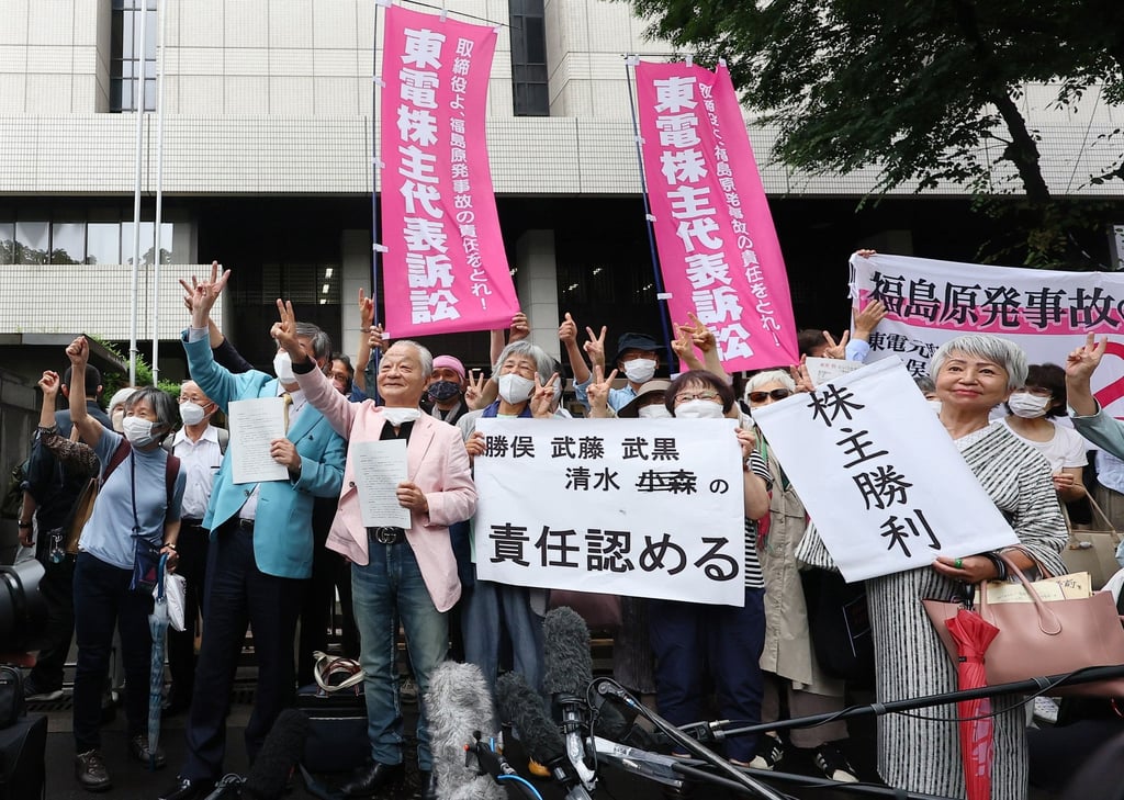 Plaintiffs in a lawsuit over Japan’s 2011 Fukushima nuclear accident celebrate on Wednesday after a court ordered former bosses at the plant’s operator to pay US$94.8 billion in damages. Photo: EPA-EFE Plaintiffs in a lawsuit over Japan’s 2011 Fukushima nuclear accident celebrate on Wednesday after a court ordered former bosses at the plant’s operator to pay US$94.8 billion in damages. Photo: EPA-EFE