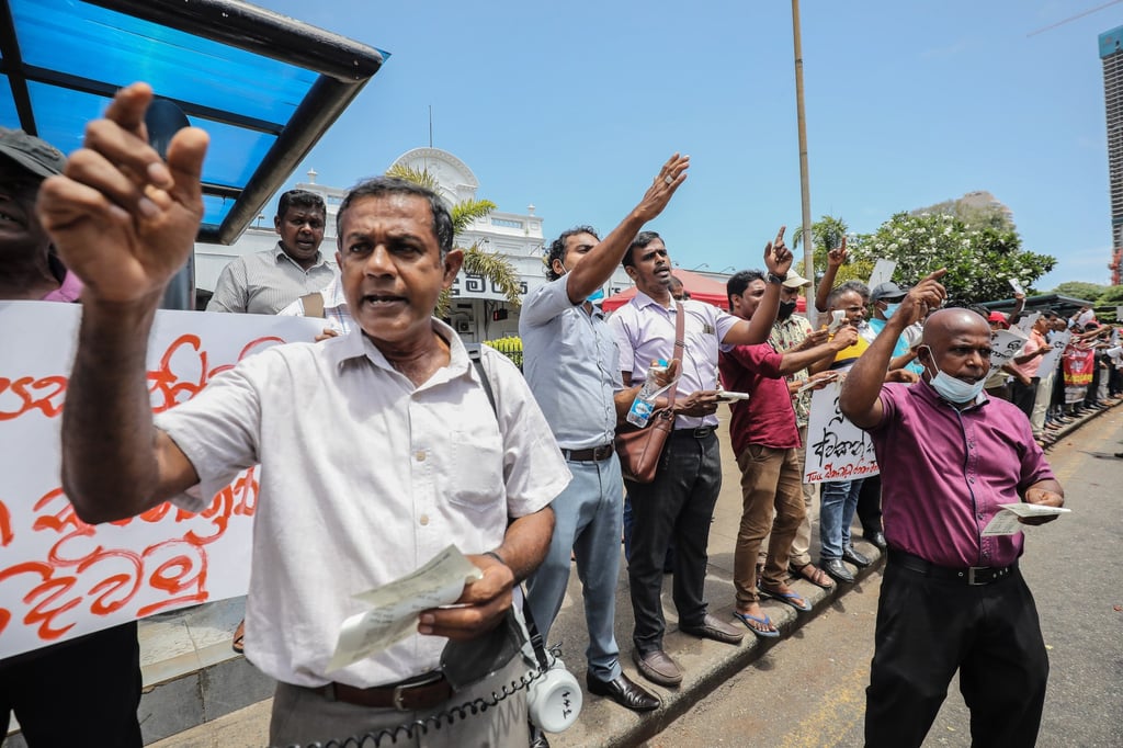 Trade union members shout slogans during a protest against the acting president Ranil Wickremesinghe, in Colombo, Sri Lanka, on Monday. Photo: EPA-EFE