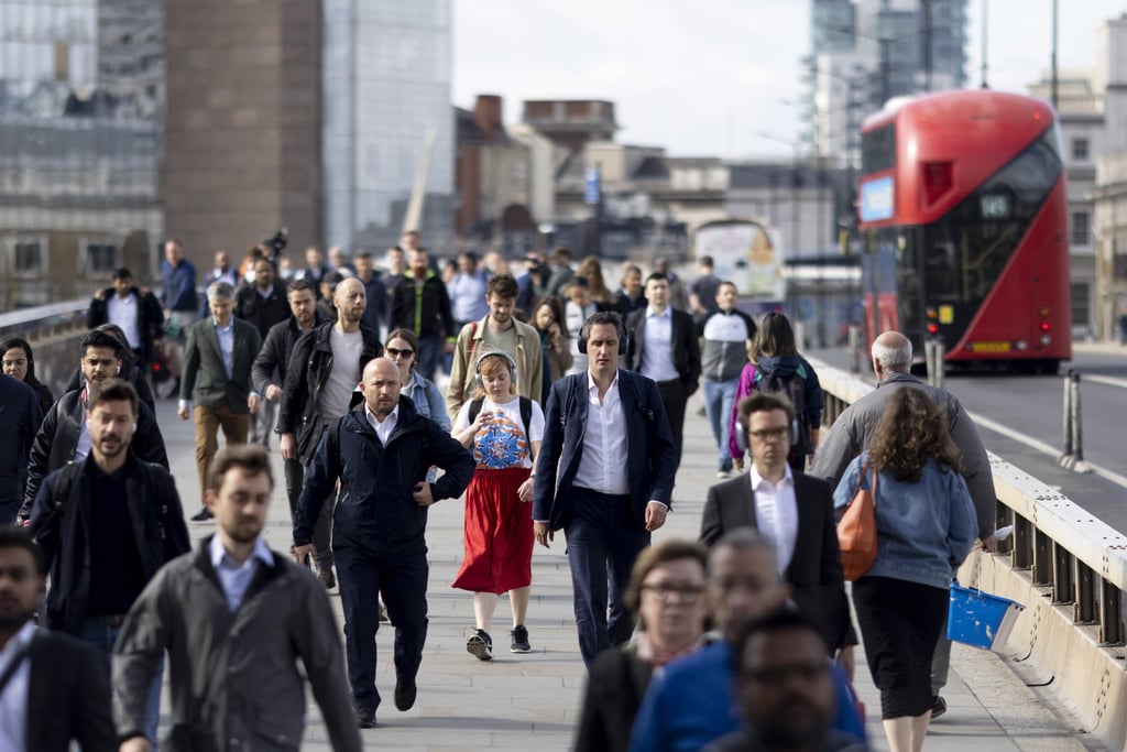 Commuters in London. Britain became more attractive this year with the fall in the exchange rate. Photo: Bloomberg Commuters in London. Britain became more attractive this year with the fall in the exchange rate. Photo: Bloomberg