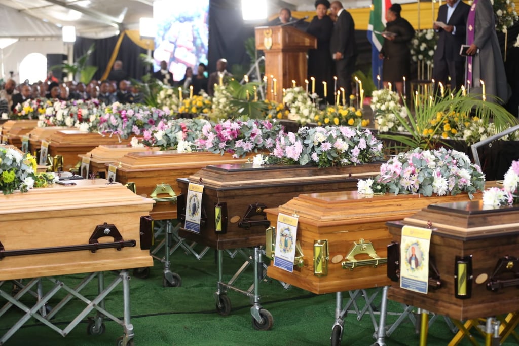 The coffins of the 21 young victims who died after a ‘Pens down’ after school party in Enyobeni Tavern in East London, South Africa. Photo: EPA-EFE