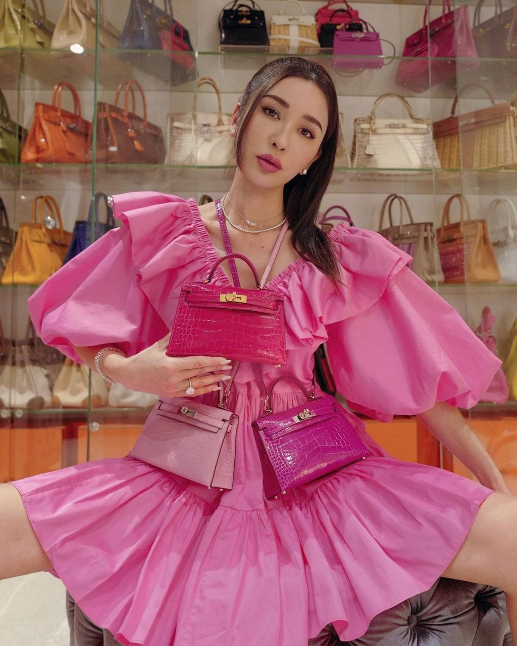 Jamie Chua with three Mini Kelly bags from Hermès. Photo: Instagram/@ec24m Jamie Chua with three Mini Kelly bags from Hermès. Photo: Instagram/@ec24m