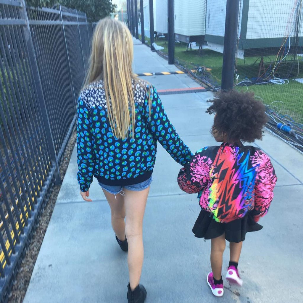 Apple Martin and Blue Ivy Carter hold hands on the way to the Super Bowl. Photo: @gwynethpaltrow/Instagram Apple Martin and Blue Ivy Carter hold hands on the way to the Super Bowl. Photo: @gwynethpaltrow/Instagram