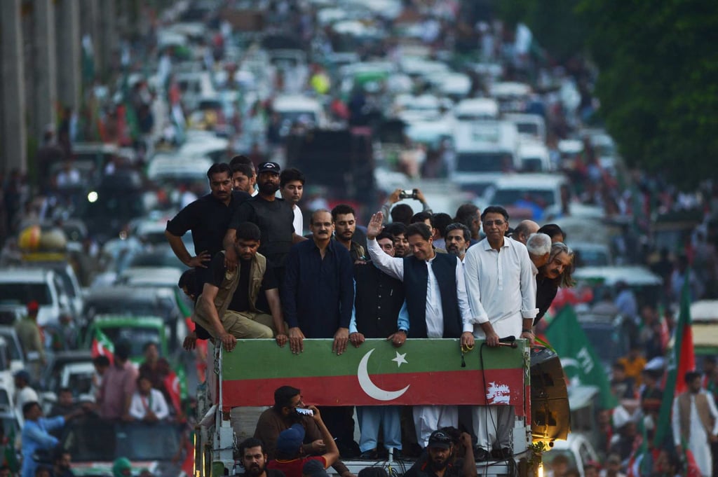 Khan gestures to supporters of his Pakistan Tehreek-e-Insaf on July 2 at a rally protesting against inflation, political destabilisation and high fuel prices. Photo: AFP Khan gestures to supporters of his Pakistan Tehreek-e-Insaf on July 2 at a rally protesting against inflation, political destabilisation and high fuel prices. Photo: AFP
