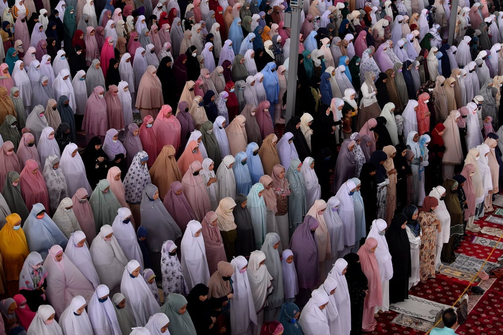 Muslim women at Malaysia’s Tuanku Mizan Zainal Abidin Mosque this month. In Afghanistan, in comparison, the Taliban have ordered all women to cover their faces in public. Photo: dpa