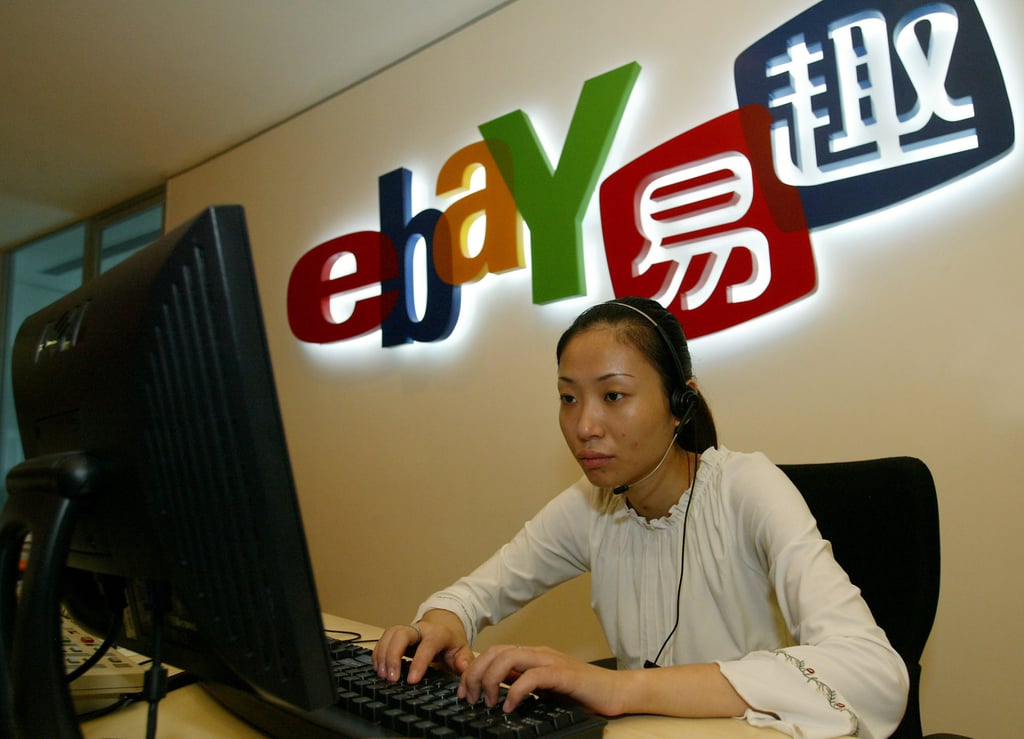 A Chinese worker checks her computer at eBay Eachnet’s offices in Shanghai on September 16, 2004. Photo: Reuters A Chinese worker checks her computer at eBay Eachnet’s offices in Shanghai on September 16, 2004. Photo: Reuters
