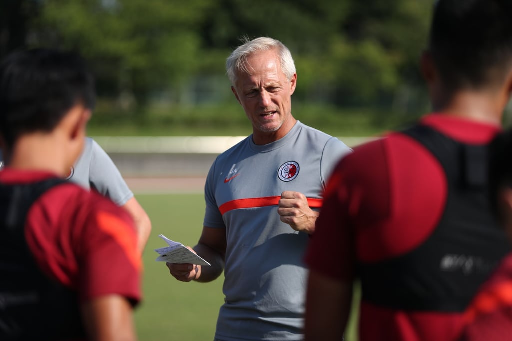Head coach Jorn Andersen and his charges before the match against China. Photo: HKFA