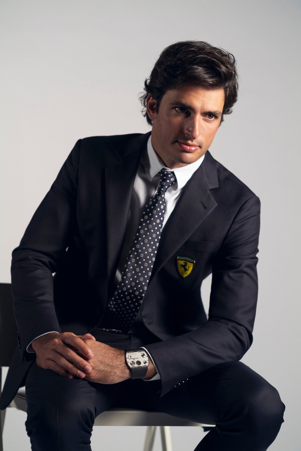 Ferrari Formula One racer Carlos Sainz sporting the Richard Mille UP-01 Ferrari watch.