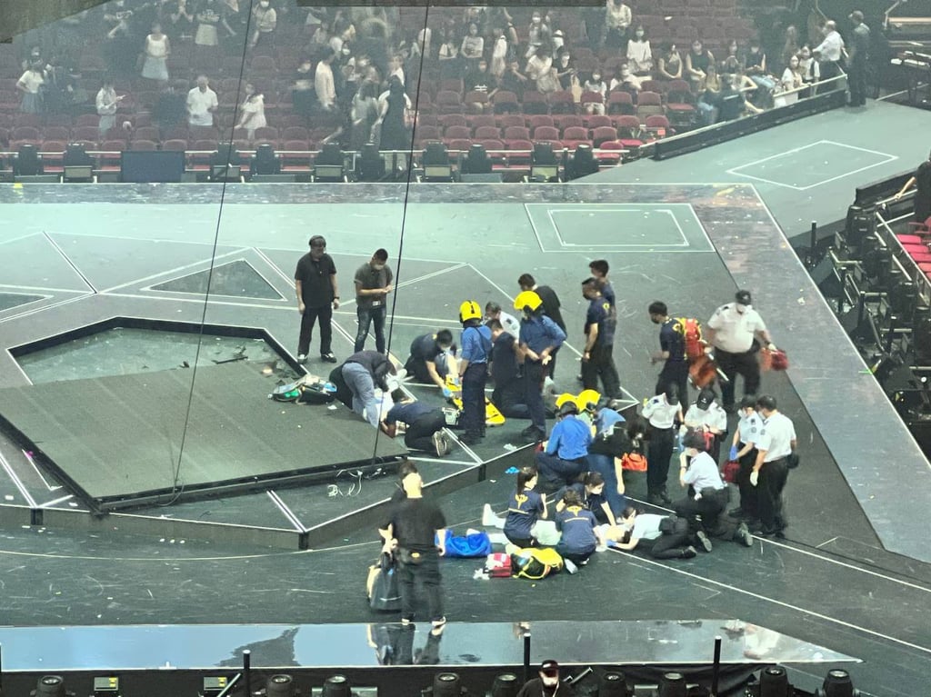 The injured dancers being treated at the site of the mishap. Photo: Handout The injured dancers being treated at the site of the mishap. Photo: Handout