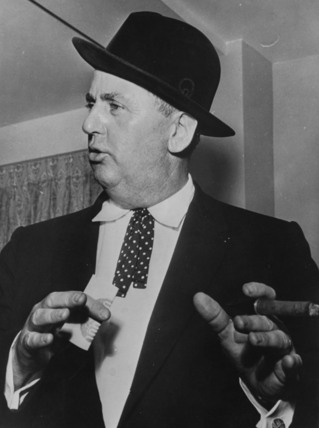 Colonel Tom Parker, manager of musician Elvis Presley, pictured smoking a cigar, circa 1955. Photo: Keystone Features/Hulton Archive/Getty Images Colonel Tom Parker, manager of musician Elvis Presley, pictured smoking a cigar, circa 1955. Photo: Keystone Features/Hulton Archive/Getty Images
