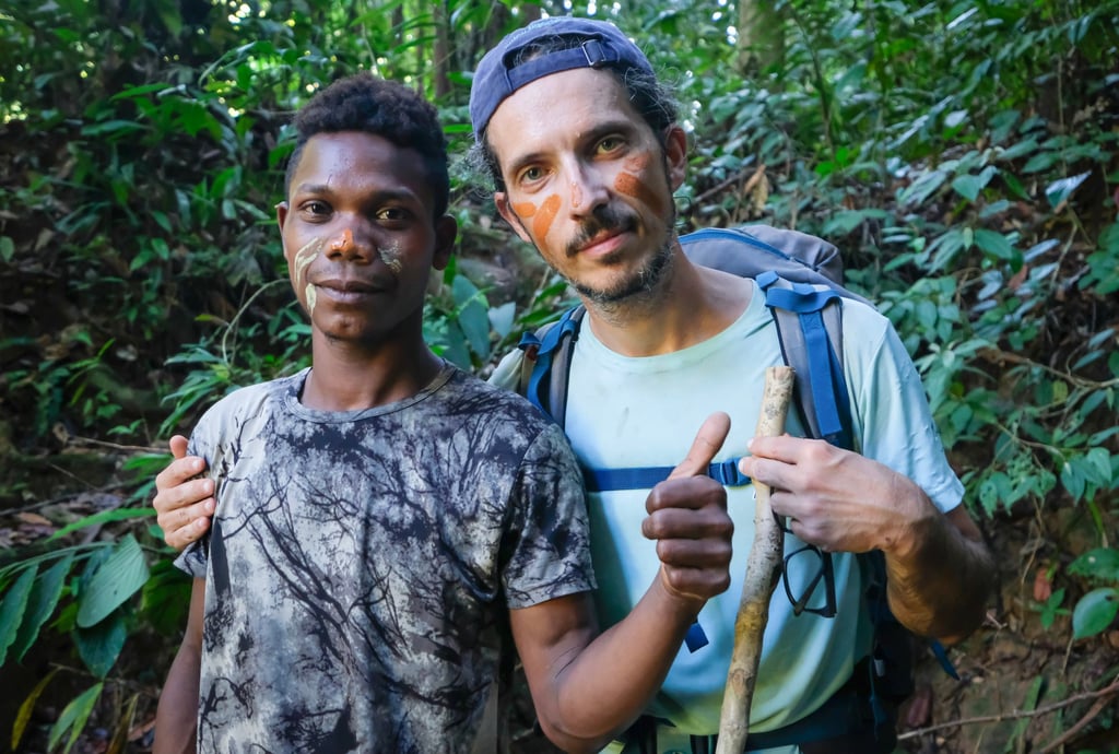 Batek guide Piyan (left) and the author on the trail in Gunung Tahan, Malaysia. Photo: Chan Kit-yeng