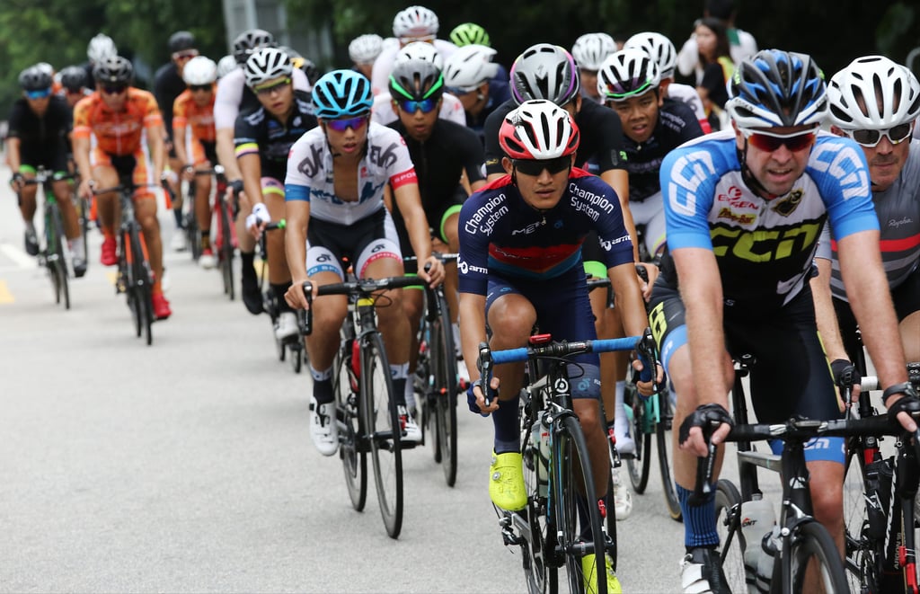 Participants compete during men's Elite Hong Kong Cycling Championships road race in Tin Shui Wai. Photo: Jonathan Wong