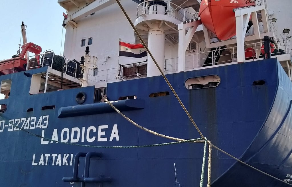 Syrian flag flutters on the ship “Laodicea” as it is docked at port of Tripoli in northern Lebanon on Friday. Photo: Reuters