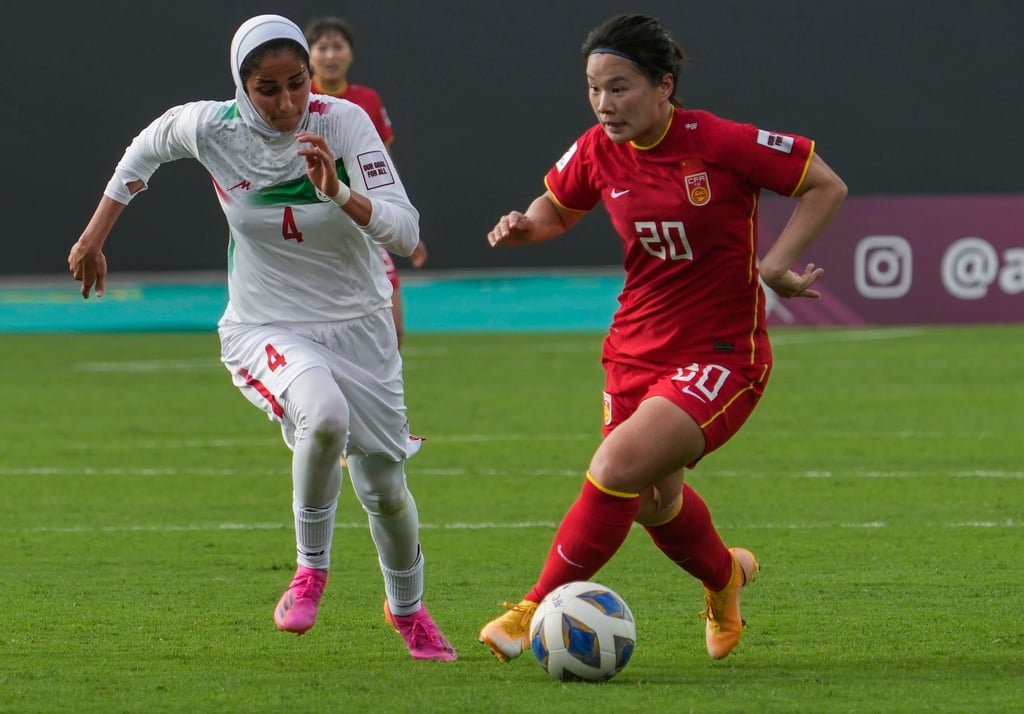 China’s Xiao Yuyi controls the ball during the AFC Women’s Asian Cup 2022 match between China and Iran at Mumbai Football Arena. Photo: AP China’s Xiao Yuyi controls the ball during the AFC Women’s Asian Cup 2022 match between China and Iran at Mumbai Football Arena. Photo: AP