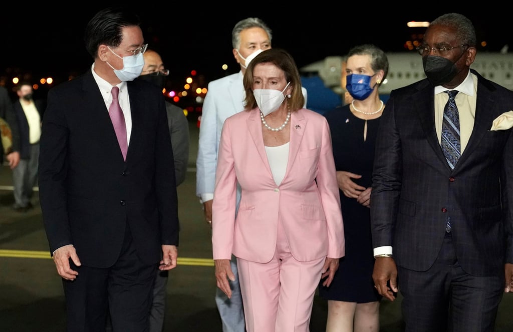 US House Speaker Nancy Pelosi (centre), walks with Taiwan’s Foreign Minister Joseph Wu (left) as she arrives with a US delegation in Taipei on August 2. Photo: Taiwan Ministry of Foreign Affairs via AP US House Speaker Nancy Pelosi (centre), walks with Taiwan’s Foreign Minister Joseph Wu (left) as she arrives with a US delegation in Taipei on August 2. Photo: Taiwan Ministry of Foreign Affairs via AP