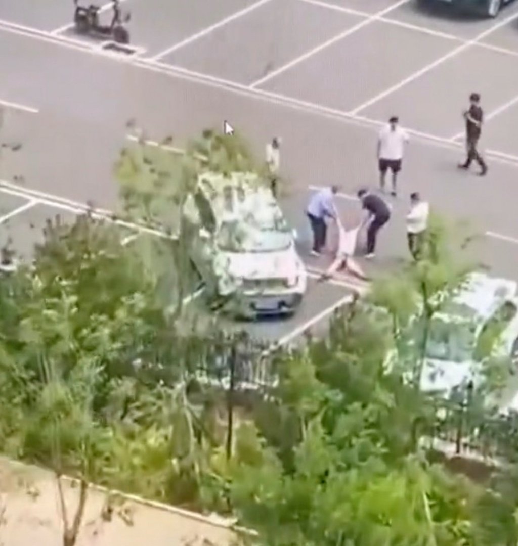 Witnesses rushed to the woman’s aid and tried to drag her to safety, but could not prevent the car from running over her three more times before the vicious attack ended. Photo: Weibo