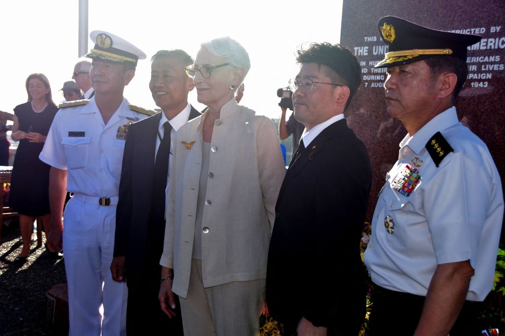US Deputy Secretary of State Wendy Sherman (C) poses for pictures with delegates and representatives from Japan at the 80th anniversary of the Battle of Guadalcanal at Skyline Ridge in Honiara, Solomon Islands on Sunday. Photo: AFP