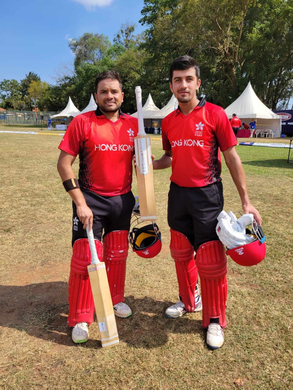 Aizaz Khan (left, alongside Hong Kong teammate Yasim Murtaza) has been backed to improve his accuracy with the ball. Photo: Cricket Hong Kong
