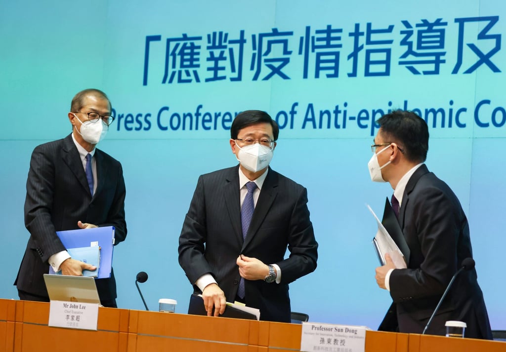 City leader John Lee (centre) with officials at Monday’s press briefing. Photo: Nora Tam City leader John Lee (centre) with officials at Monday’s press briefing. Photo: Nora Tam