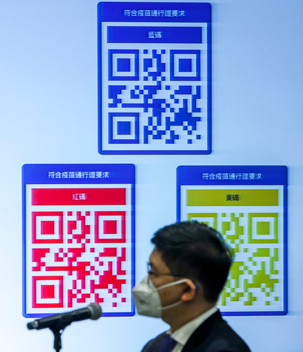 Red, amber and blue QR codes are displayed during an Anti-epidemic Command and Coordination Group press conference in Hong Kong on Monday. Photo: Nora Tam