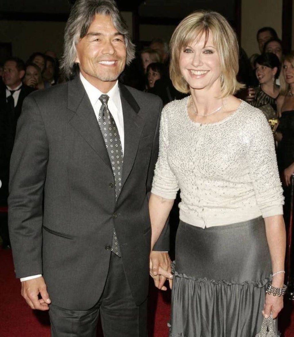 Olivia Newton-John with Patrick McDermott. Photo: @SunDispatch/Twitter Olivia Newton-John with Patrick McDermott. Photo: @SunDispatch/Twitter