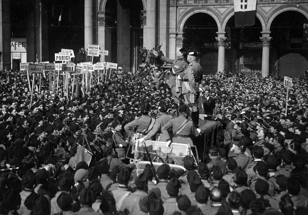 Italian fascist leader Benito Mussolini addresses a crowd in Milan in 1925. In Anthony Marra’s novel Mercury Pictures Presents, Maria and her mother are forced to emigrate to the United States. Photo: Getty Images Italian fascist leader Benito Mussolini addresses a crowd in Milan in 1925. In Anthony Marra’s novel Mercury Pictures Presents, Maria and her mother are forced to emigrate to the United States. Photo: Getty Images