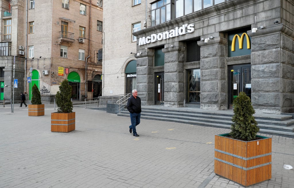 A man walks past a closed McDonald’s restaurant in central Kyiv, Ukraine. Photo: Reuters