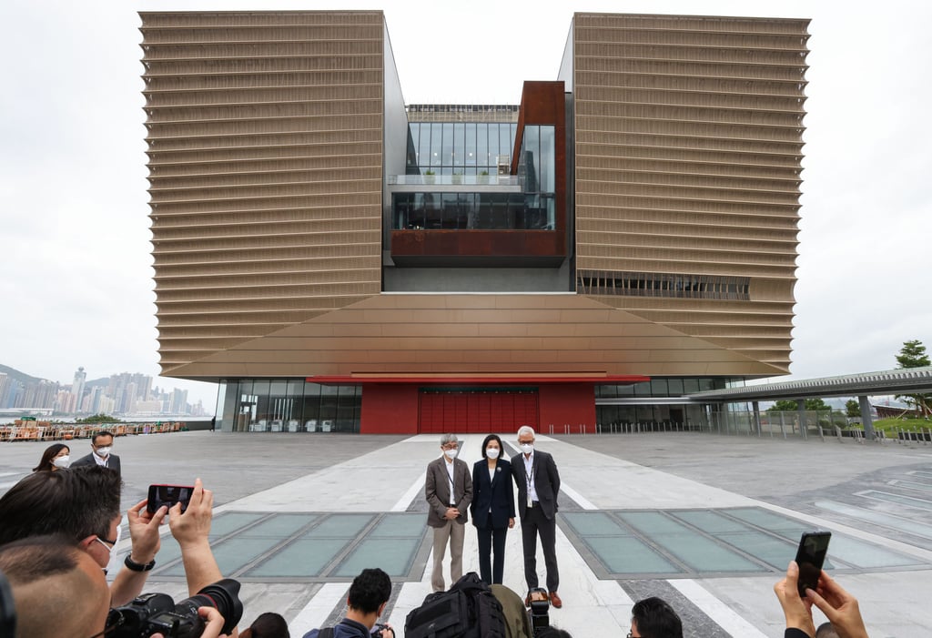 Ng (centre right) stands with Betty Fung (centre), CEO of the West Kowloon Cultural District Authority, and HKPM designer Rocco Yim, at an event to announce the completion of the museum building, on May 10, 2022. Photo: Nora Tam