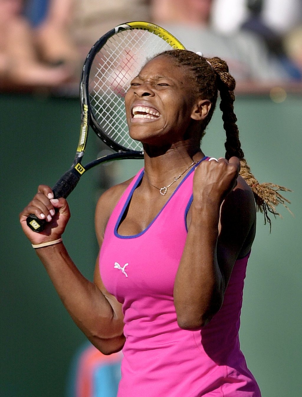 Serena Williams reacts to winning a point before defeating Kim Clijsters of Belgium in their finals match at the Tennis Masters Series, in 2001, in Indian Wells, California. Photo: AP Photo
