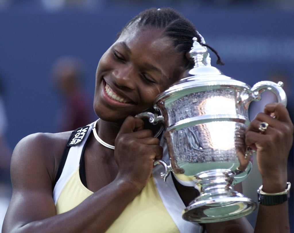Serena Williams poses with her women’s singles championship trophy after defeating Martina Hingis at the US Open in New York, in 1999. Photo: AP Photo