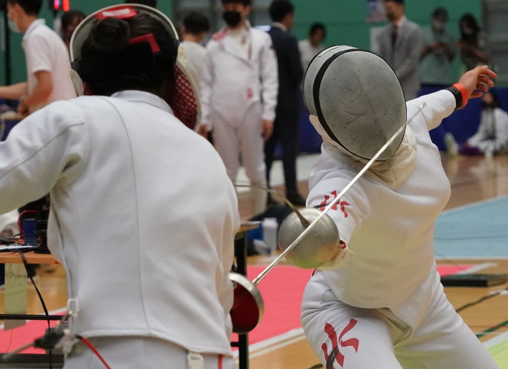 Kaylin Hsieh Sin-yan (right) in action at the LCSD Open Fencing Championships at Hong Kong Park Sports Centre. Photo: Felix Wong Kaylin Hsieh Sin-yan (right) in action at the LCSD Open Fencing Championships at Hong Kong Park Sports Centre. Photo: Felix Wong