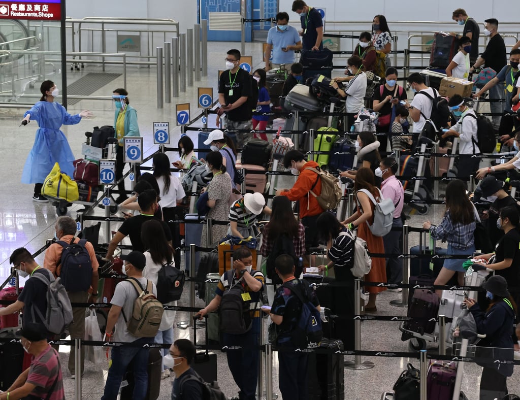 Travellers arrive at Hong Kong International Airport. Photo: K. Y. Cheng Travellers arrive at Hong Kong International Airport. Photo: K. Y. Cheng