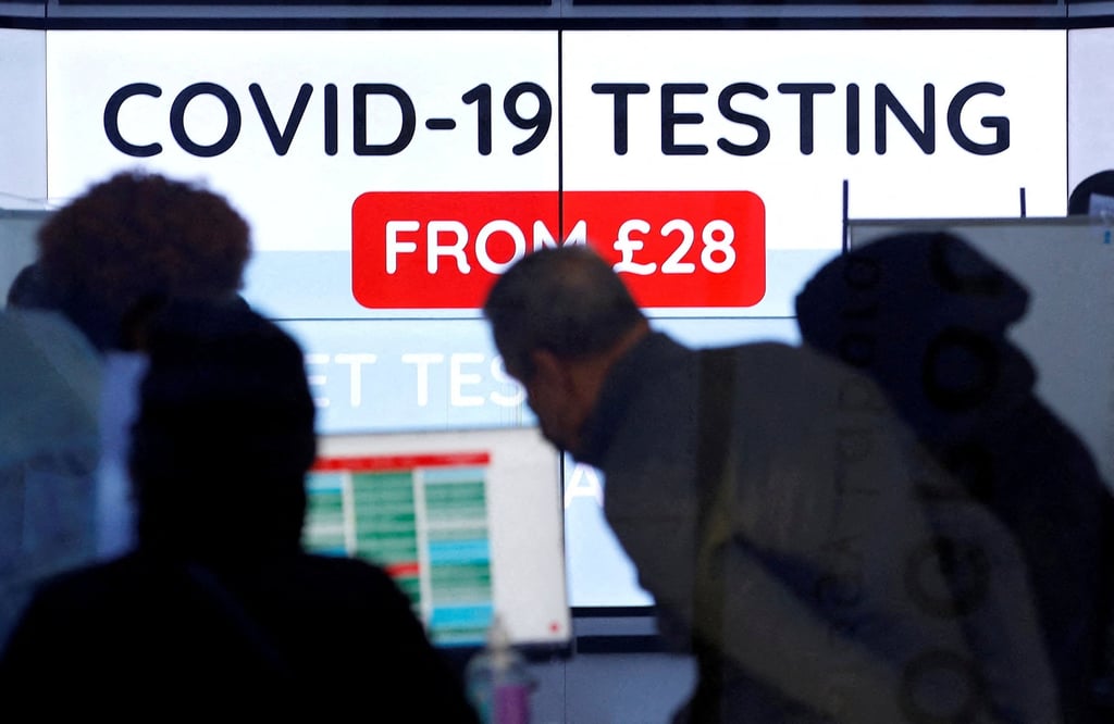 Customers in a private Covid-19 testing clinic in London, Britain. File photo: Reuters