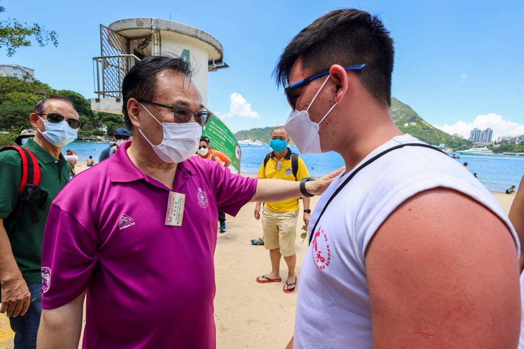 Johnnie Chan (left), honorary secretary of The Hong Kong Life Saving Society, visits Deep Water Bay Beach. Photo: Dickson Lee Johnnie Chan (left), honorary secretary of The Hong Kong Life Saving Society, visits Deep Water Bay Beach. Photo: Dickson Lee