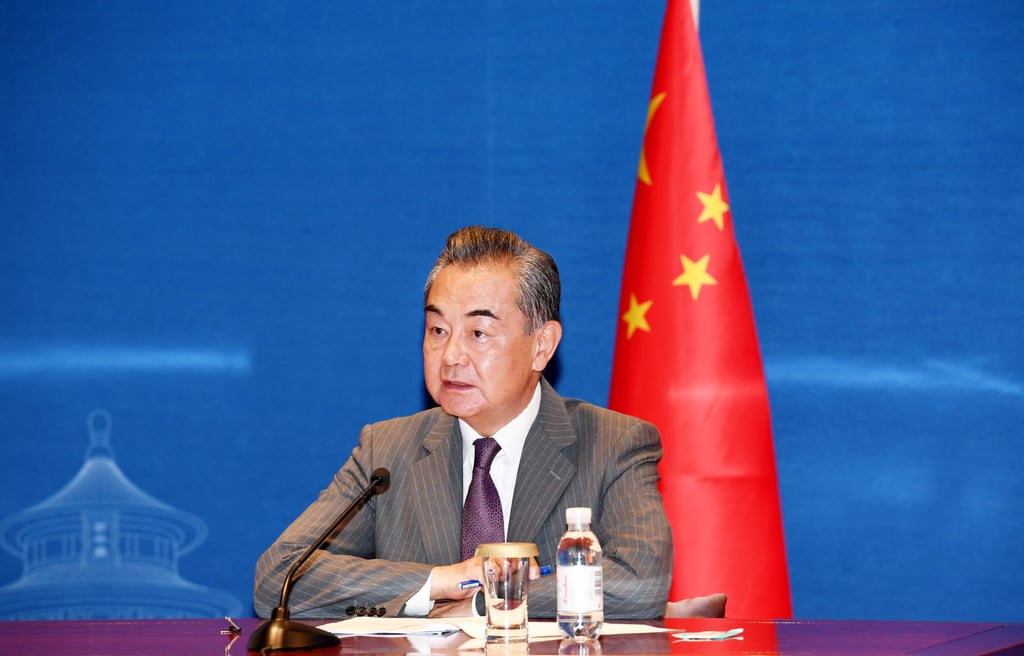 Wang Yi addresses a virtual meeting with Asian and African envoys to the UN in Geneva. Photo: Xinhua