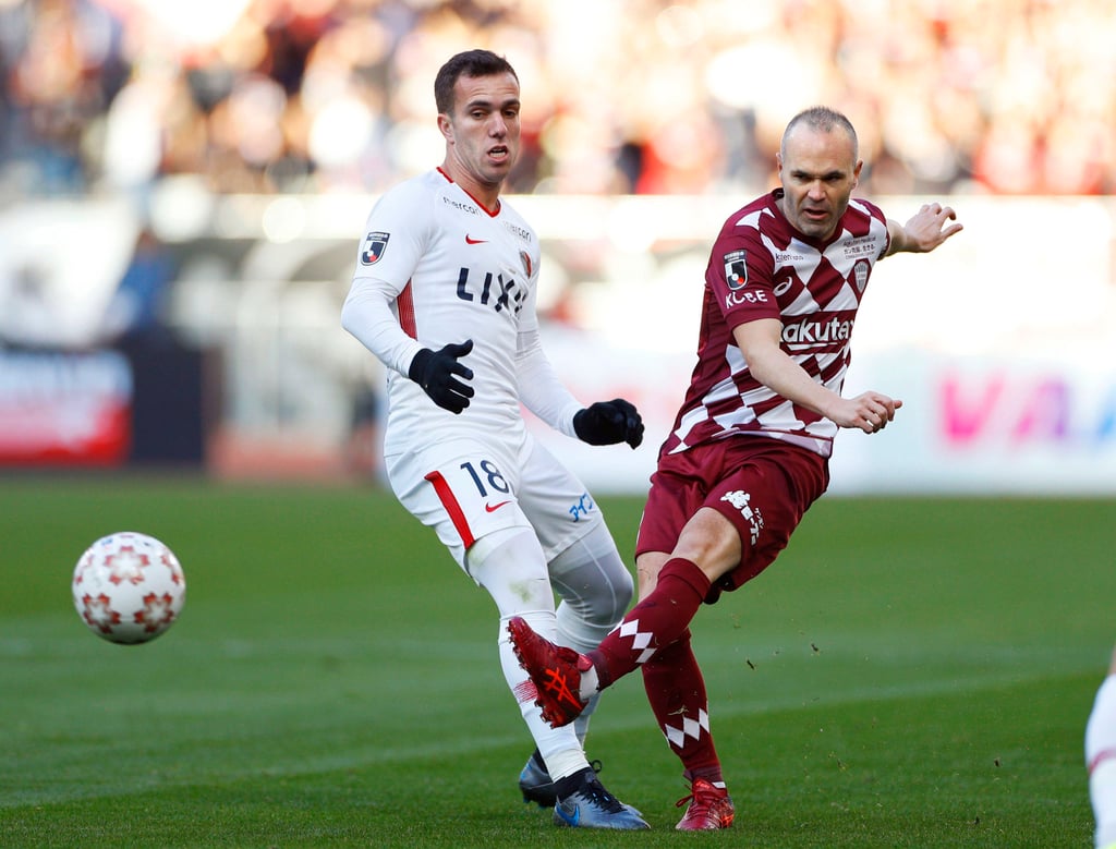 Vissel Kobe’s Andres Iniesta (right) controls a ball against Kashima Antlers’ Serginho during the Emperor’s Cup soccer final in Tokyo. Photo: AP Vissel Kobe’s Andres Iniesta (right) controls a ball against Kashima Antlers’ Serginho during the Emperor’s Cup soccer final in Tokyo. Photo: AP
