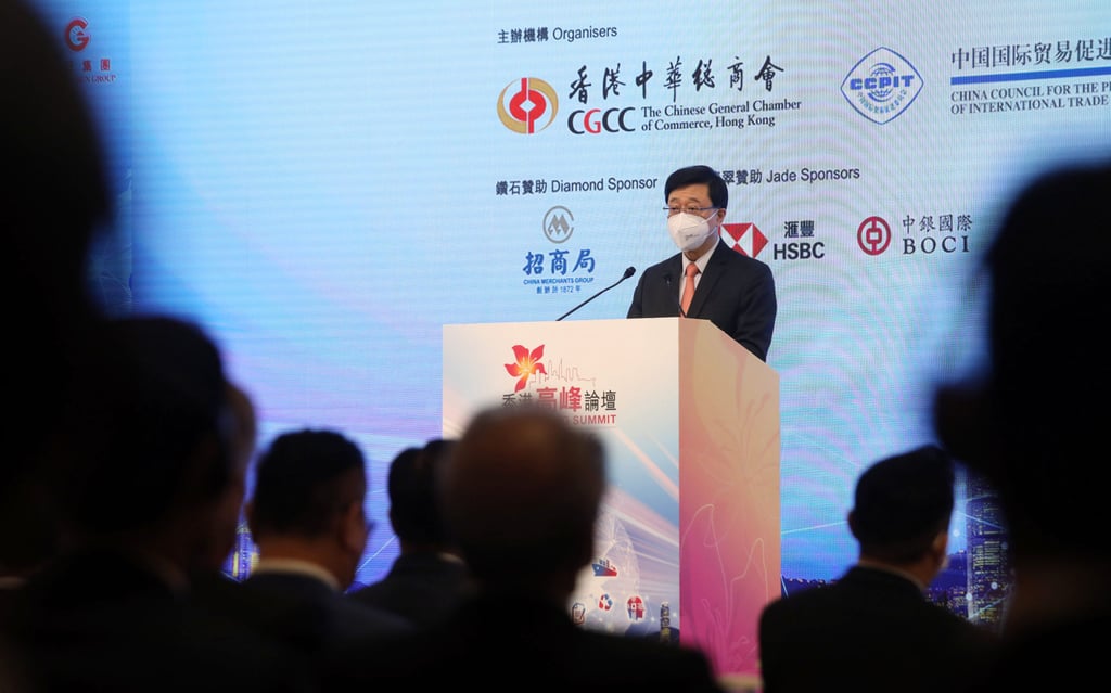John Lee addresses business chambers at the summit on Wednesday. Photo: Xiaomei Chen