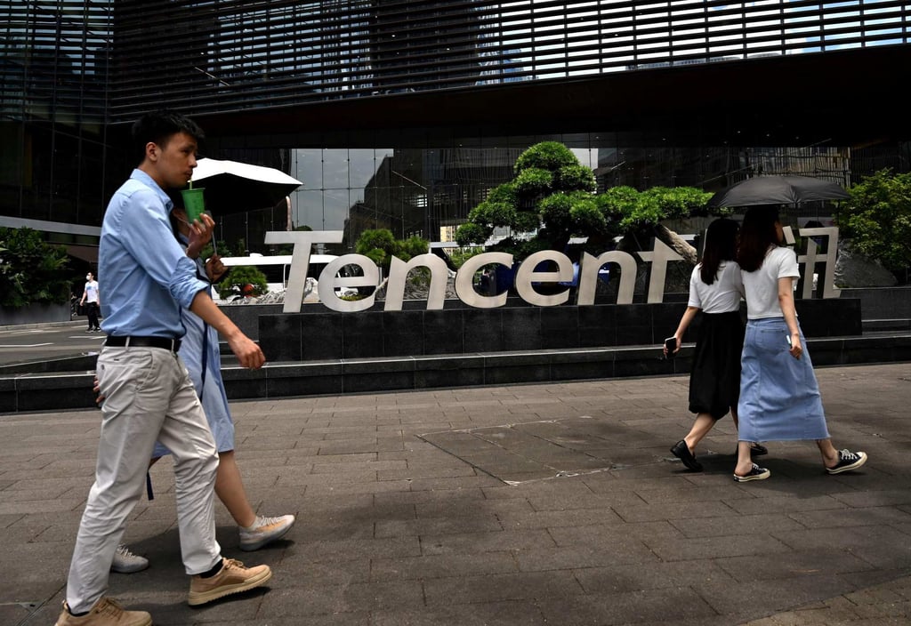 People walking past the Tencent headquarters in the southern Chinese city of Shenzhen. Photo: AFP People walking past the Tencent headquarters in the southern Chinese city of Shenzhen. Photo: AFP